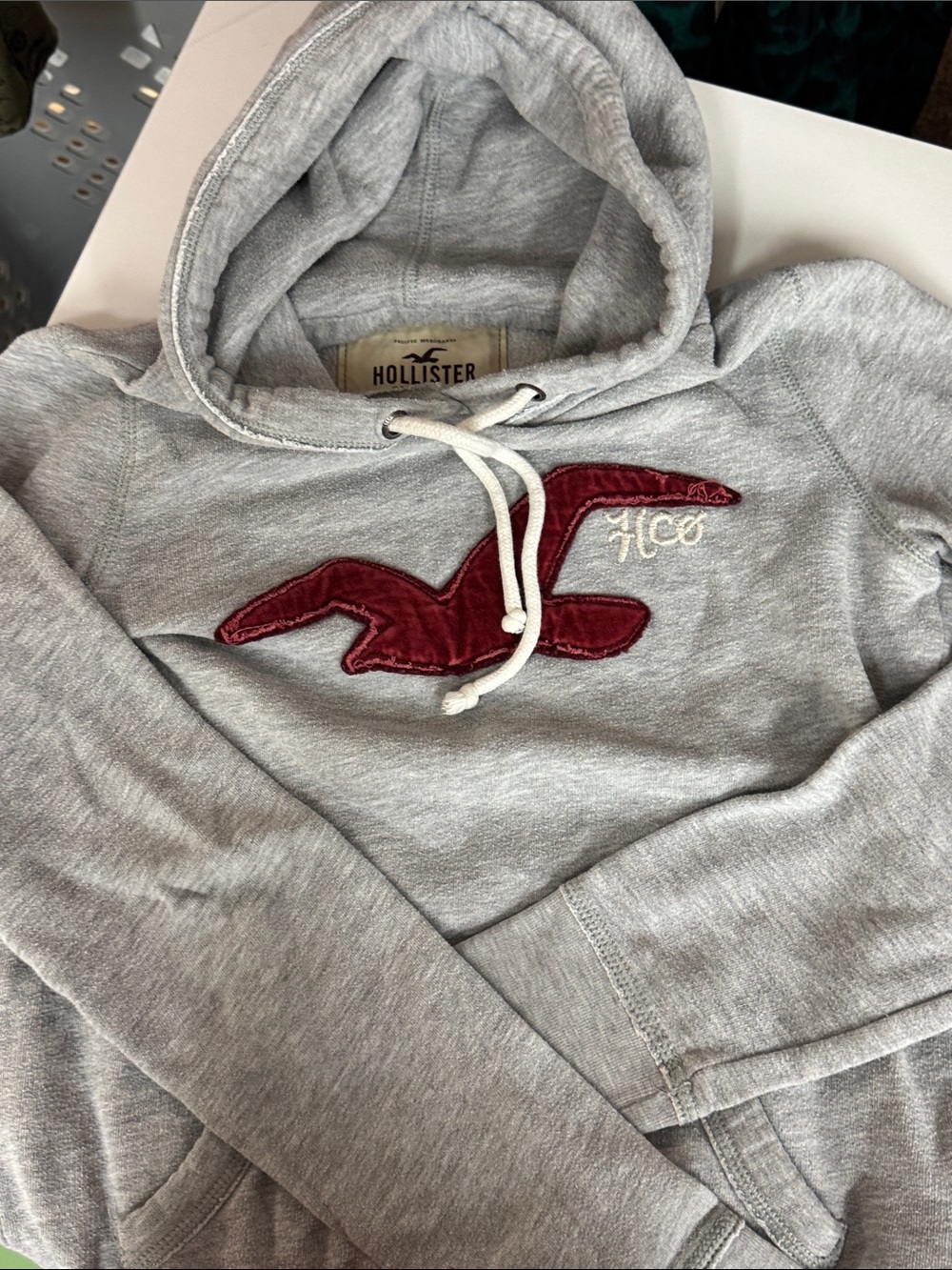 Hollister Men's Light Gray Crewneck Hoodie with Maroon Seagull Logo